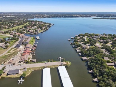 Check out this low-maintenance, waterfront townhome in the on De Cordova Bend Country Club in Texas - for sale on GolfHomes.com, golf home, golf lot