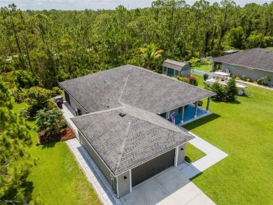 Experience the Best of Country Elegance and Modern Living in on Seminole Lakes Country Club in Florida - for sale on GolfHomes.com, golf home, golf lot