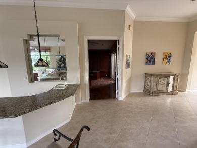 This 3-bedroom plus den, 3.5-bath home is located in the on Wycliffe Golf and Country Club in Florida - for sale on GolfHomes.com, golf home, golf lot