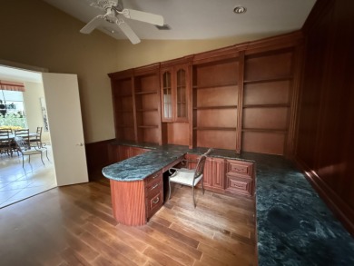 This 3-bedroom plus den, 3.5-bath home is located in the on Wycliffe Golf and Country Club in Florida - for sale on GolfHomes.com, golf home, golf lot