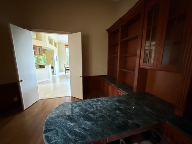 This 3-bedroom plus den, 3.5-bath home is located in the on Wycliffe Golf and Country Club in Florida - for sale on GolfHomes.com, golf home, golf lot