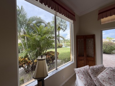This 3-bedroom plus den, 3.5-bath home is located in the on Wycliffe Golf and Country Club in Florida - for sale on GolfHomes.com, golf home, golf lot