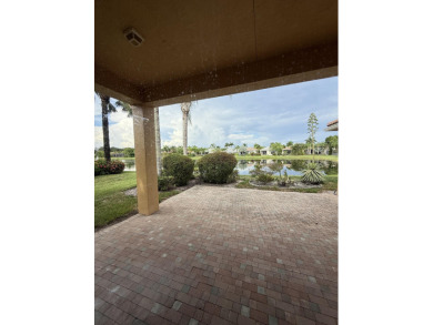 This 3-bedroom plus den, 3.5-bath home is located in the on Wycliffe Golf and Country Club in Florida - for sale on GolfHomes.com, golf home, golf lot