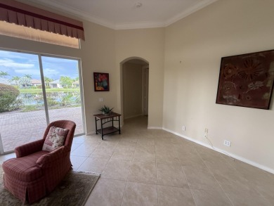 This 3-bedroom plus den, 3.5-bath home is located in the on Wycliffe Golf and Country Club in Florida - for sale on GolfHomes.com, golf home, golf lot