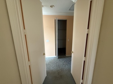 This 3-bedroom plus den, 3.5-bath home is located in the on Wycliffe Golf and Country Club in Florida - for sale on GolfHomes.com, golf home, golf lot