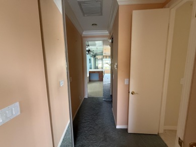 This 3-bedroom plus den, 3.5-bath home is located in the on Wycliffe Golf and Country Club in Florida - for sale on GolfHomes.com, golf home, golf lot