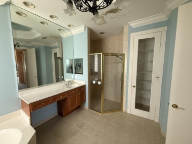 This 3-bedroom plus den, 3.5-bath home is located in the on Wycliffe Golf and Country Club in Florida - for sale on GolfHomes.com, golf home, golf lot