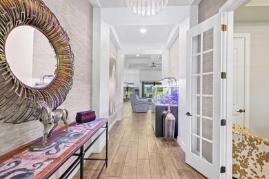 On one of the largest lots in Ancient Tree, this half-acre on Palm Beach Gardens Golf Course in Florida - for sale on GolfHomes.com, golf home, golf lot