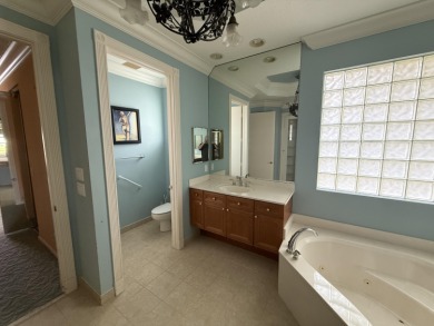 This 3-bedroom plus den, 3.5-bath home is located in the on Wycliffe Golf and Country Club in Florida - for sale on GolfHomes.com, golf home, golf lot