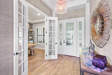 On one of the largest lots in Ancient Tree, this half-acre on Palm Beach Gardens Golf Course in Florida - for sale on GolfHomes.com, golf home, golf lot