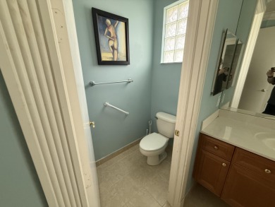 This 3-bedroom plus den, 3.5-bath home is located in the on Wycliffe Golf and Country Club in Florida - for sale on GolfHomes.com, golf home, golf lot