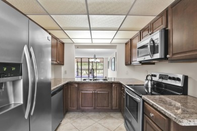Lowest 2 BDRM in the GLENS!! Desirable 3rd floor location on The Country Club At Boca Raton in Florida - for sale on GolfHomes.com, golf home, golf lot