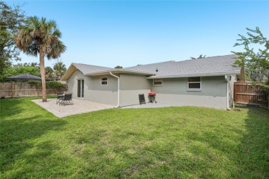 Welcome to your slice of paradise in the GOLF-CART friendly on Gulf Harbors Golf Course in Florida - for sale on GolfHomes.com, golf home, golf lot