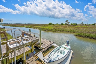 Waterfront Majesty with private dock in DeBordieu Colony! Fully on DeBordieu Country Club in South Carolina - for sale on GolfHomes.com, golf home, golf lot