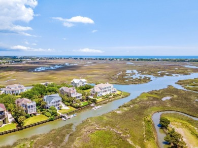 Waterfront Majesty with private dock in DeBordieu Colony! Fully on DeBordieu Country Club in South Carolina - for sale on GolfHomes.com, golf home, golf lot