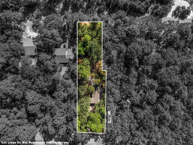 Welcome home to a warm and inviting retreat tucked away among on Holly Lake Ranch Golf Club in Texas - for sale on GolfHomes.com, golf home, golf lot