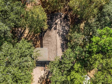 Welcome home to a warm and inviting retreat tucked away among on Holly Lake Ranch Golf Club in Texas - for sale on GolfHomes.com, golf home, golf lot