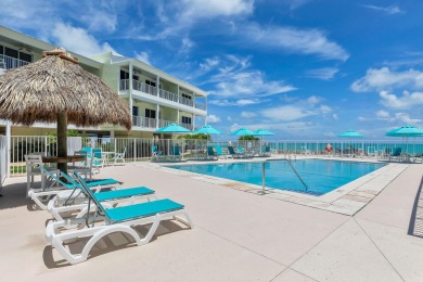 White sand oceanfront condo with breathtaking blue ocean views on Key Colony Beach Golf Course in Florida - for sale on GolfHomes.com, golf home, golf lot