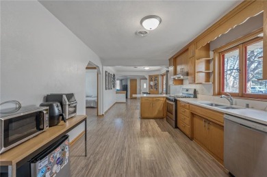 This updated 4-bedroom, 2-bath home is in a great Saint Paul on Phalen Park Golf Course in Minnesota - for sale on GolfHomes.com, golf home, golf lot