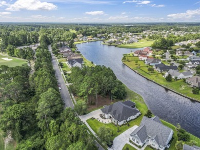 BUILD YOUR DREAM HOME on this stunning 0.82-acre lake lot in the on Wild Wing Plantation in South Carolina - for sale on GolfHomes.com, golf home, golf lot