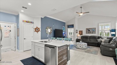This beautifully appointed DREAMSICLE sits on a unique lot with on LPGA International Golf Course in Florida - for sale on GolfHomes.com, golf home, golf lot