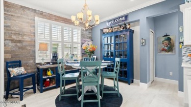 This beautifully appointed DREAMSICLE sits on a unique lot with on LPGA International Golf Course in Florida - for sale on GolfHomes.com, golf home, golf lot