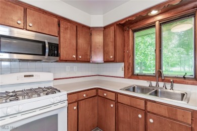 This charming brick ranch offers comfort, privacy, and a unique on Airport Greens Golf Club in Ohio - for sale on GolfHomes.com, golf home, golf lot