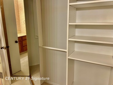 Enjoy easy living in this 2-bedroom, 2-full-bath condo perfectly on Swan Valley Golf Club in Michigan - for sale on GolfHomes.com, golf home, golf lot