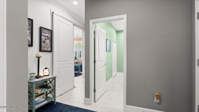 This beautifully appointed DREAMSICLE sits on a unique lot with on LPGA International Golf Course in Florida - for sale on GolfHomes.com, golf home, golf lot