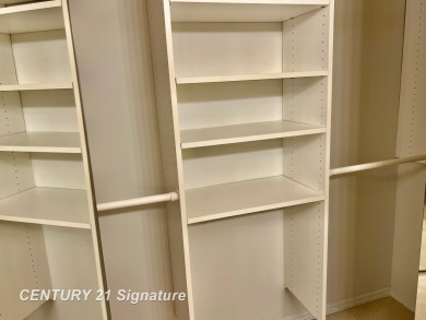 Enjoy easy living in this 2-bedroom, 2-full-bath condo perfectly on Swan Valley Golf Club in Michigan - for sale on GolfHomes.com, golf home, golf lot
