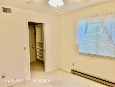 Enjoy easy living in this 2-bedroom, 2-full-bath condo perfectly on Swan Valley Golf Club in Michigan - for sale on GolfHomes.com, golf home, golf lot