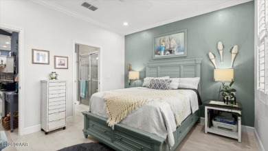 This beautifully appointed DREAMSICLE sits on a unique lot with on LPGA International Golf Course in Florida - for sale on GolfHomes.com, golf home, golf lot