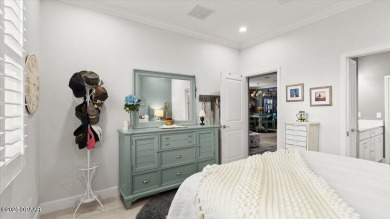 This beautifully appointed DREAMSICLE sits on a unique lot with on LPGA International Golf Course in Florida - for sale on GolfHomes.com, golf home, golf lot