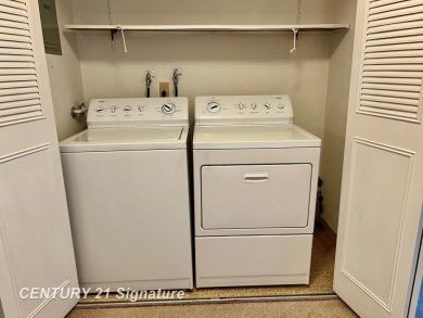Enjoy easy living in this 2-bedroom, 2-full-bath condo perfectly on Swan Valley Golf Club in Michigan - for sale on GolfHomes.com, golf home, golf lot