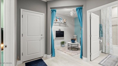 This beautifully appointed DREAMSICLE sits on a unique lot with on LPGA International Golf Course in Florida - for sale on GolfHomes.com, golf home, golf lot
