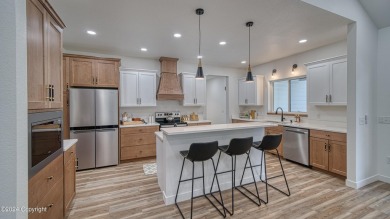 Stunning custom-built home within walking distance to Keyhole on Keyhole Golf and Country Club in Wyoming - for sale on GolfHomes.com, golf home, golf lot