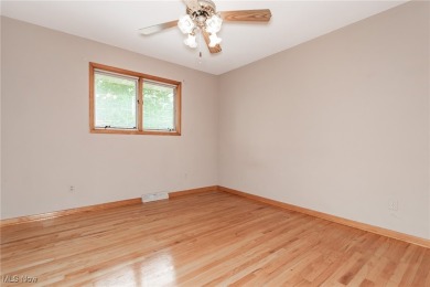 This charming brick ranch offers comfort, privacy, and a unique on Airport Greens Golf Club in Ohio - for sale on GolfHomes.com, golf home, golf lot