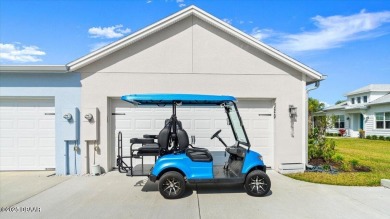This beautifully appointed DREAMSICLE sits on a unique lot with on LPGA International Golf Course in Florida - for sale on GolfHomes.com, golf home, golf lot