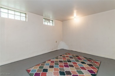 This charming brick ranch offers comfort, privacy, and a unique on Airport Greens Golf Club in Ohio - for sale on GolfHomes.com, golf home, golf lot