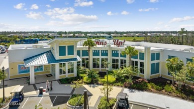 This beautifully appointed DREAMSICLE sits on a unique lot with on LPGA International Golf Course in Florida - for sale on GolfHomes.com, golf home, golf lot