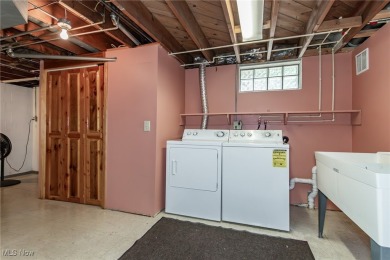 This charming brick ranch offers comfort, privacy, and a unique on Airport Greens Golf Club in Ohio - for sale on GolfHomes.com, golf home, golf lot