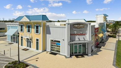 This beautifully appointed DREAMSICLE sits on a unique lot with on LPGA International Golf Course in Florida - for sale on GolfHomes.com, golf home, golf lot