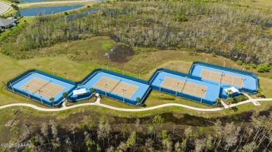 This beautifully appointed DREAMSICLE sits on a unique lot with on LPGA International Golf Course in Florida - for sale on GolfHomes.com, golf home, golf lot