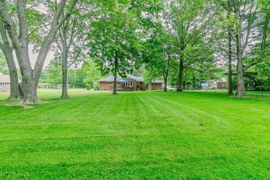 This charming brick ranch offers comfort, privacy, and a unique on Airport Greens Golf Club in Ohio - for sale on GolfHomes.com, golf home, golf lot
