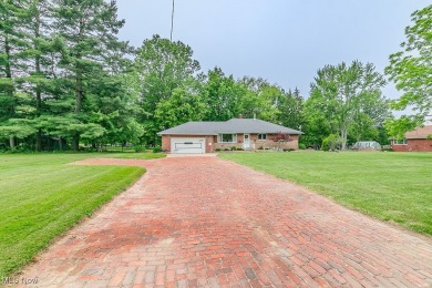 This charming brick ranch offers comfort, privacy, and a unique on Airport Greens Golf Club in Ohio - for sale on GolfHomes.com, golf home, golf lot