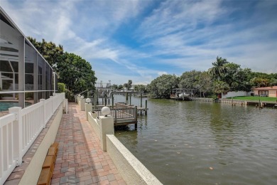 This fabulous WATERFRONT home is located in highly desirable on Rocky Point Golf Course in Florida - for sale on GolfHomes.com, golf home, golf lot