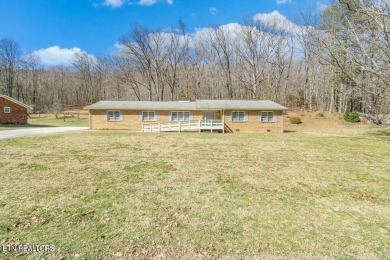 Appealing brick rancher with many new updates located in on Emory Golf and Country Club in Tennessee - for sale on GolfHomes.com, golf home, golf lot