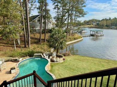 OUTSTANDING ARCHITECTURAL MASTERPIECE IN THE PLANTATION - THE on The Patriot Golf Club At Grand Harbor in South Carolina - for sale on GolfHomes.com, golf home, golf lot