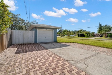 Welcome home to 1714 58th St S in Gulfport, FL.  This amazing on Pasadena Yacht and Country Club in Florida - for sale on GolfHomes.com, golf home, golf lot