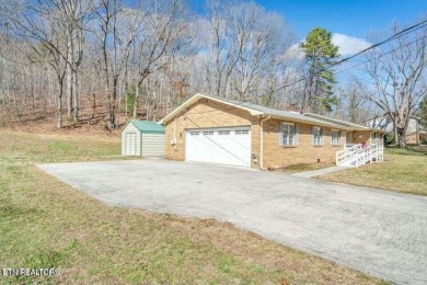 Appealing brick rancher with many new updates located in on Emory Golf and Country Club in Tennessee - for sale on GolfHomes.com, golf home, golf lot